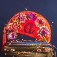 1.&nbsp;Monogram crescent pouch: View at Anthropologie