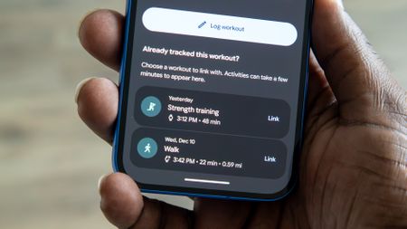 Fitbit personal health coach linking a tracked working