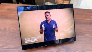 Huawei Mate XT Ultimate Design showing YouTube video