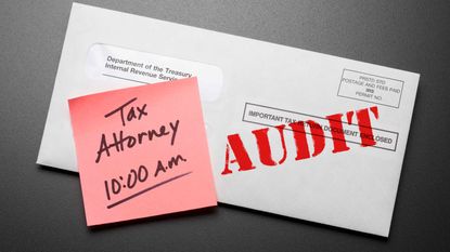 picture of audit letter from IRS with a post-it on it saying "tax attorney 10:00 a.m."