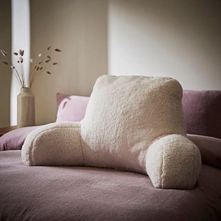 Dunelm's teddy high-back cuddle pillow