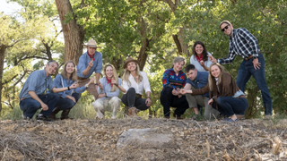 The members of NASA’s 2025 Astronaut Candidate Class pose with rock samples collected during their geology training at the Rio Grande del Norte National Monument, New Mexico, in May 2026.