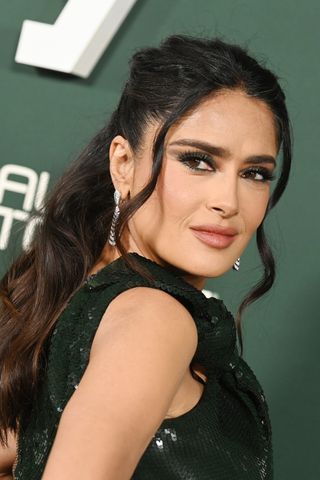 Salma Hayek is pictured with brunette hair at the 2023 Baby2Baby Gala held on November 11, 2023 in Los Angeles, California.