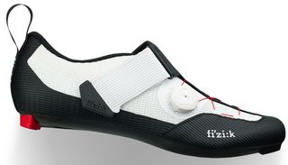 A red, black and white Fizik triathlon shoe on a white background