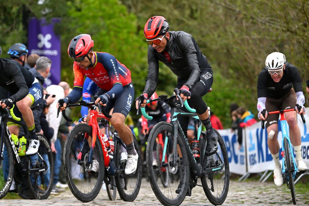 OVERIJSE BELGIUM APRIL 12 LR Michal Kwiatkowski of Poland and Team INEOS Grenadiers and Warren Barguil of France and Team Arka Samsic compete during the 63rd De Brabantse Pijl La Fleche Brabanconne 2023 Mens Elite a 2051km one day race from Leuven to Overijse on April 12 2023 in Overijse Belgium Photo by Luc ClaessenGetty Images