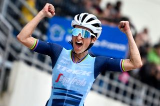 TOPSHOT Britains Elizabeth Lizzie Deignan celebrates as she crosses the finish line to win the first edition of the women elite race of the ParisRoubaix cycling event 1165km from Denain to Roubaix on October 2 2021 Belgium OUT Photo by ERIC LALMAND BELGA AFP Belgium OUT Photo by ERIC LALMANDBELGAAFP via Getty Images