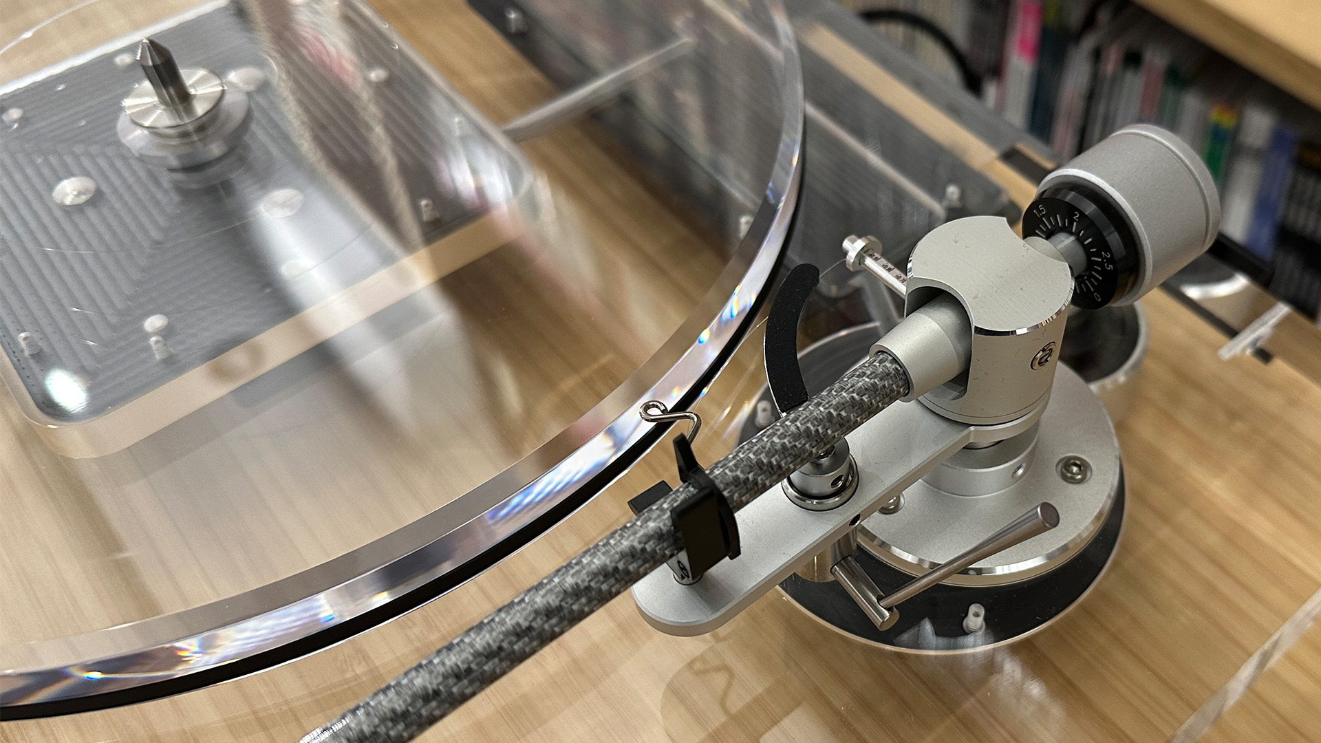 Audio-Technica AT-LPA2 turntable, close up on tone arm and acrylic platter