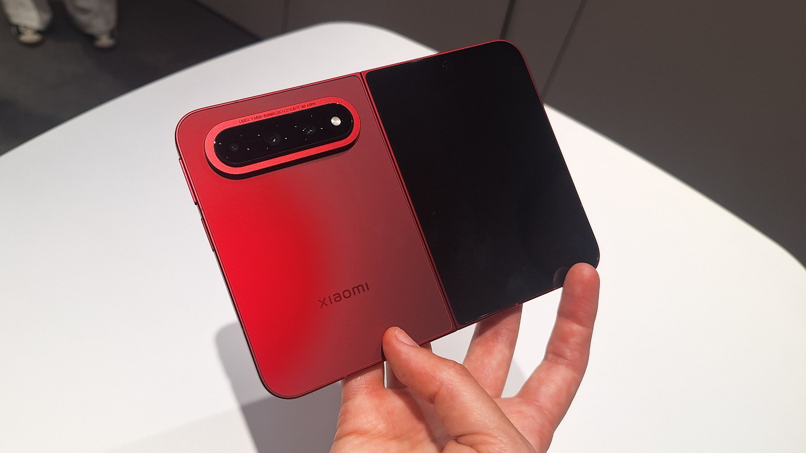 The Xiaomi 18 Fold being held in the hand