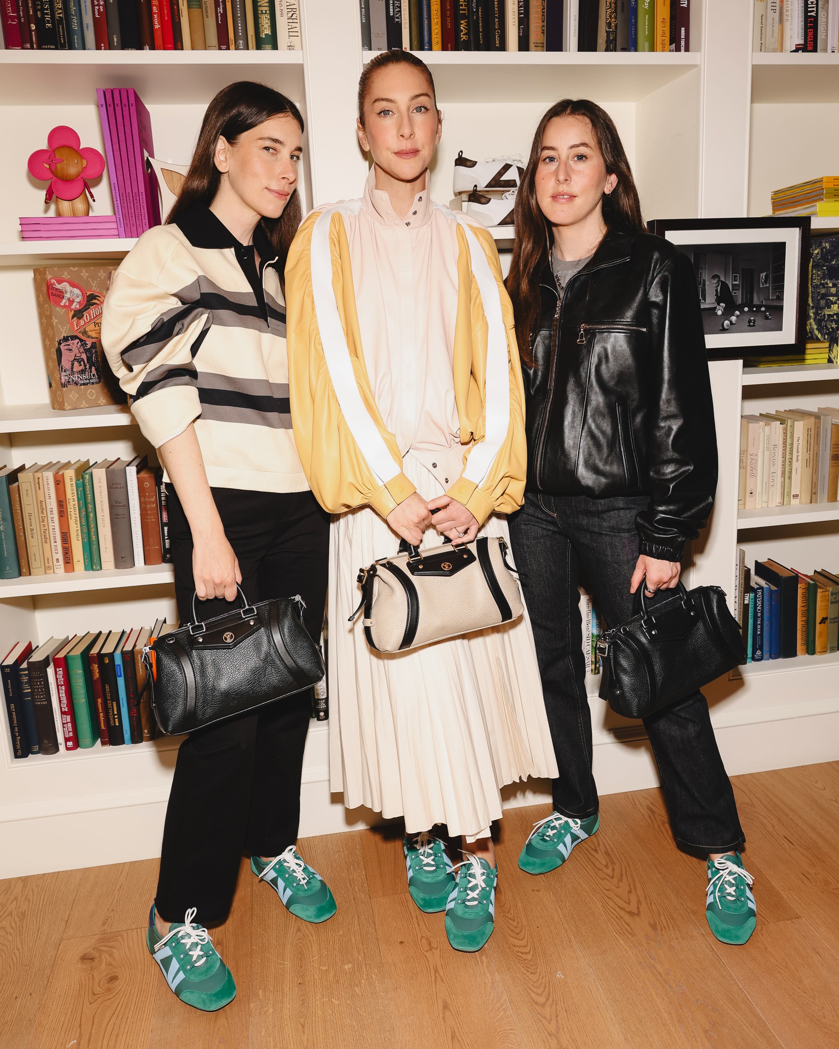the Haim sisters wearing Louis Vuitton sneakerina