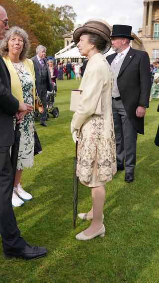 Princess Anne, Princess Royal talks to guests during a Garden Party at Buckingham Palace