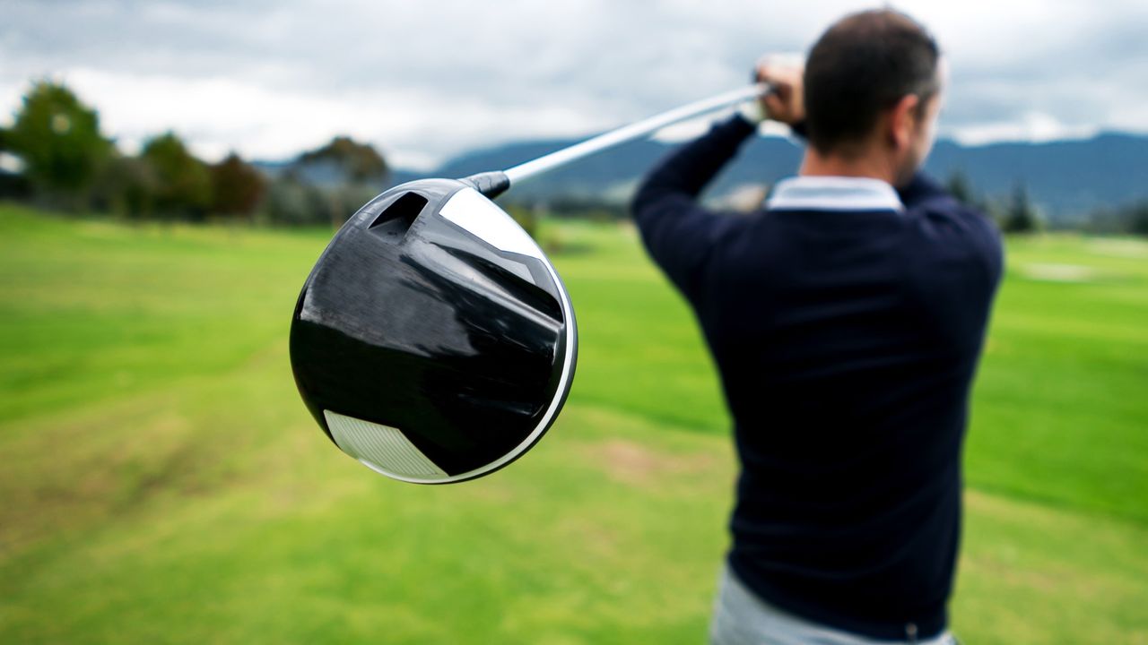 Golfer doing a practice swing