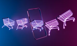 Shopping carts with a neon outline exiting a smartphone screen, symbolizing e-commerce and online shopping trends.