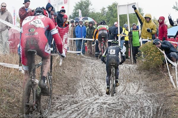 Troy Wells, Jamey Driscoll and Yannick Eckmann climb in the mud.