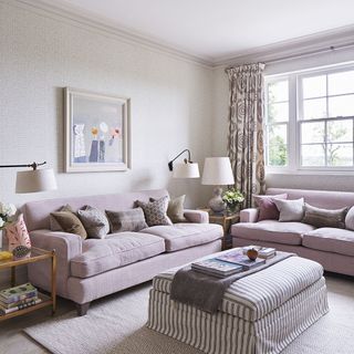snug area with sofa cushions and table lamp