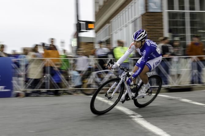 A UnitedhealthCare rider glides through the sixth turn on Saturday during the Winston-Salem Criterium.