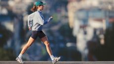 A woman performing a walking workout