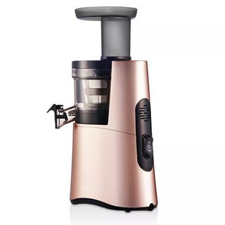 Hurom H-AA slow juicer in pink