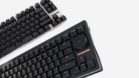 A couple of Wooting 80HE+ keyboards.