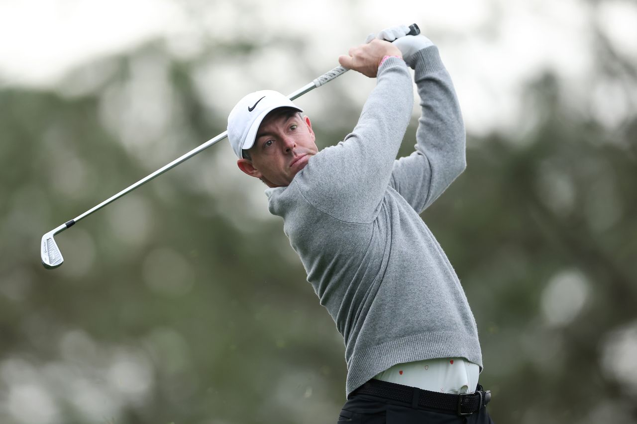 Rory McIlroy of Northern Ireland plays a shot on the fourth hole during a practice round prior to the 2026 Masters Tournament at Augusta National Golf Club