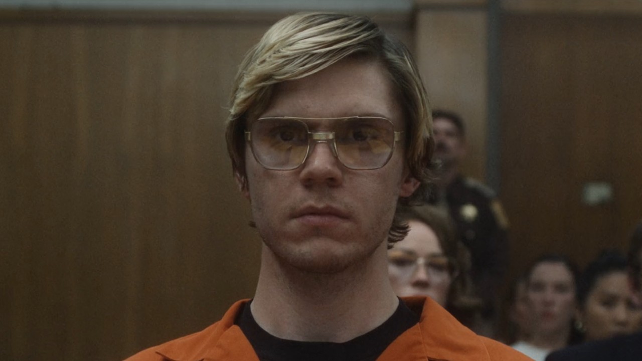 Evan Peters as Jeffery Dahmer in a Dahmer prison uniform.