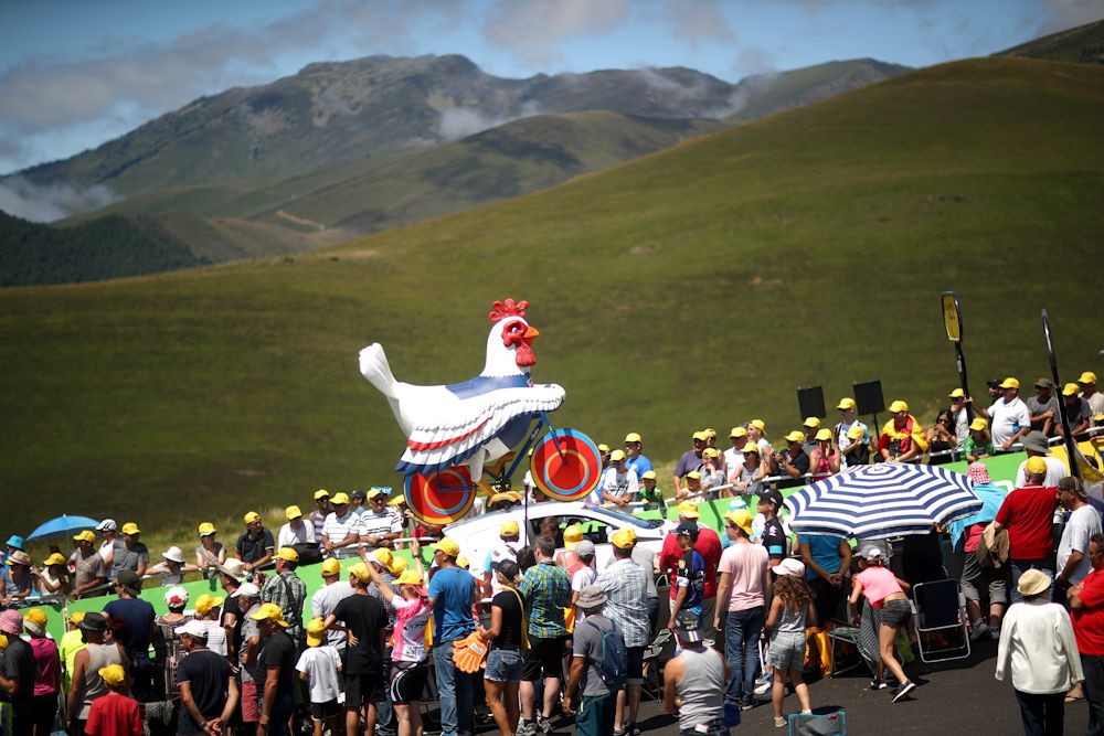 Keeping the Tour de France rolling, one rooster car at a time