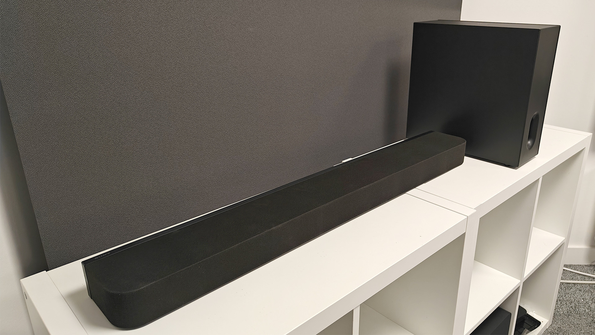 Sony Bravia Theatre Bar 7 + S soundbar package on white shelving unit