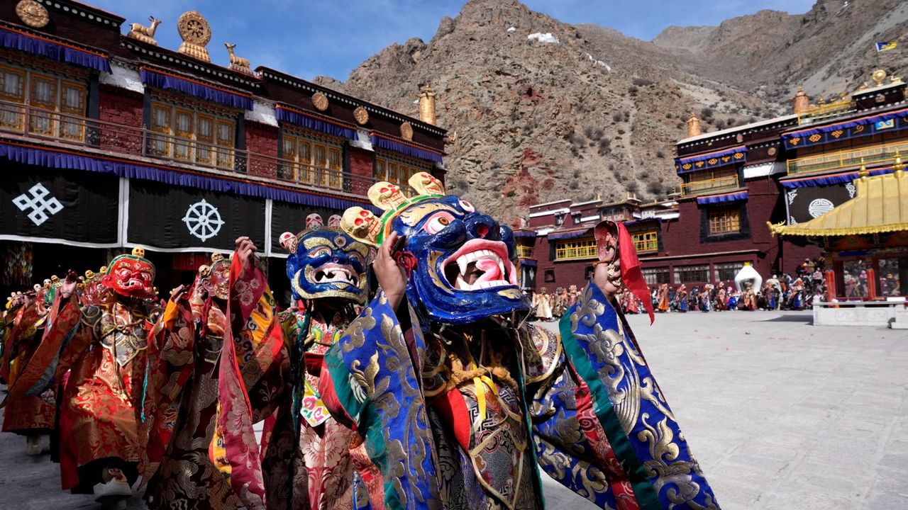 Buddhist monks perform during the Tibetan New Year in Lhasa on Feb. 27, 2025.