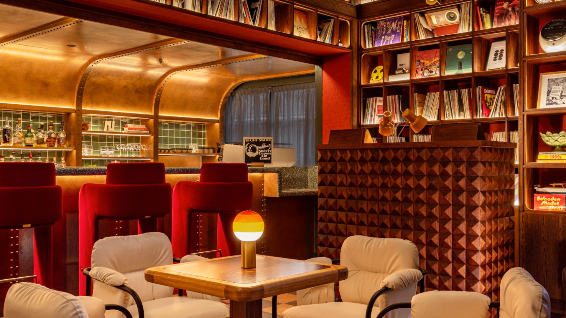 an image of the interior of the listening bar showing the corner of the bar and the DJ booth