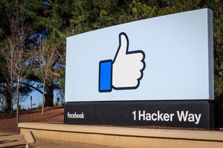 Facebook sign at entrance of its campus