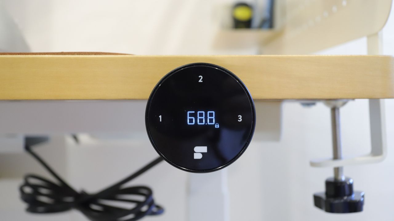 EverDesk Max Health Controller displaying a sitting height in centimetres