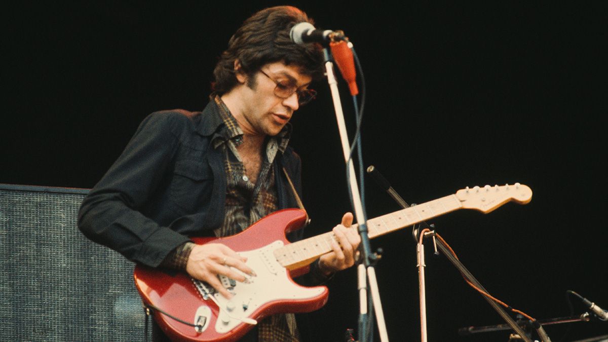 Canadian singer-songwriter and guitarist Robbie Robertson performing with The Band at Wembley, London, 14th September 1974