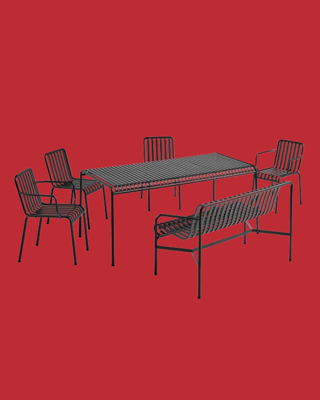 Hay Palissade Patio Set in blackk against red background.