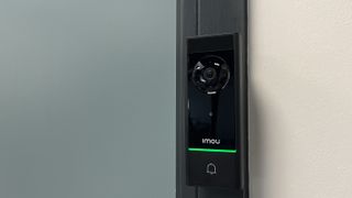 imou video doorbell attached to a door frame
