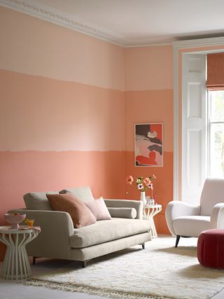 A living room painted with three shades of pink