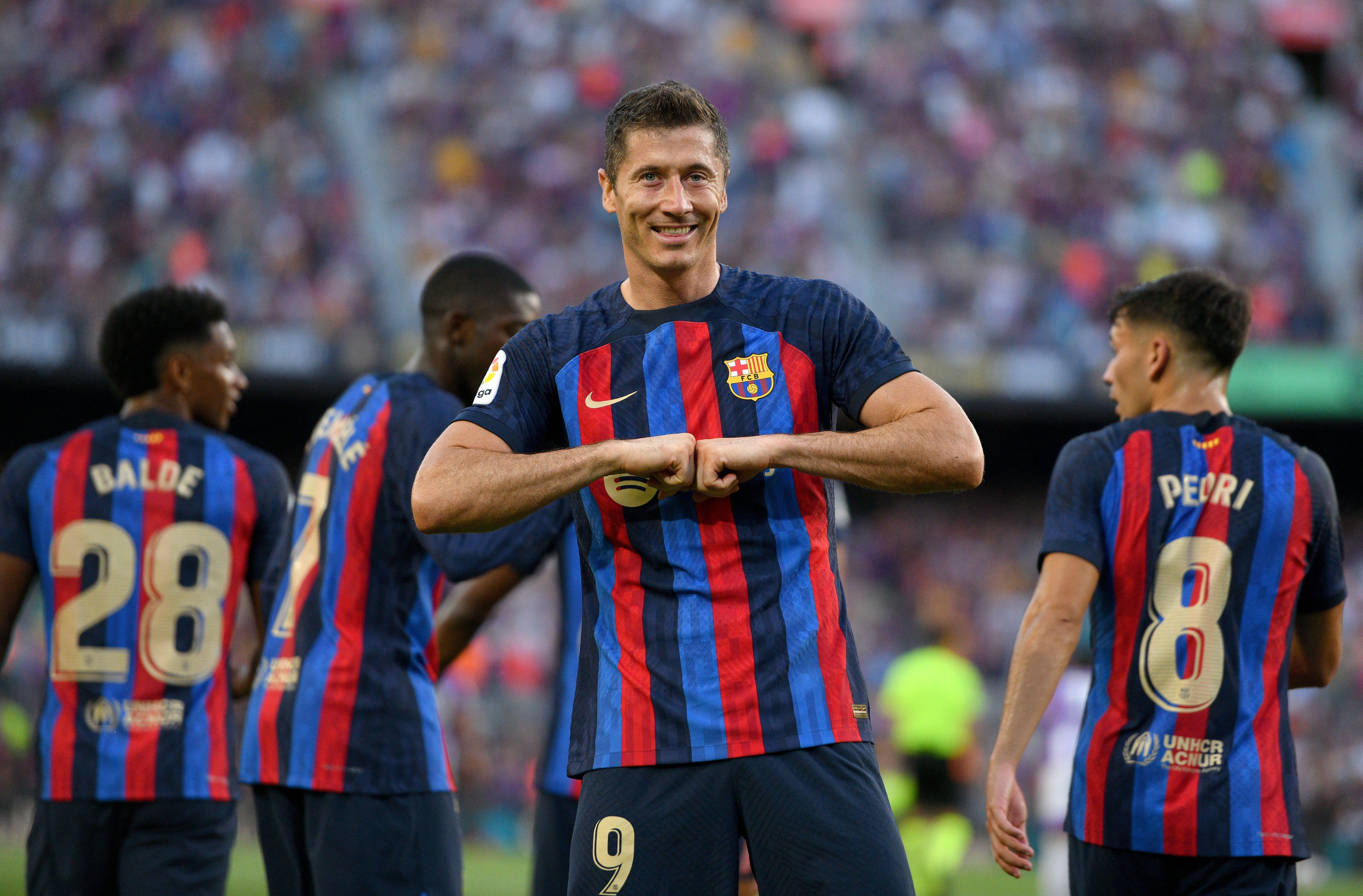 Robert Lewandowski celebrates after scoring for Barcelona, 2022