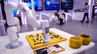 An iFLYTEK robot plays 'Go', or 'Weiqi', during an exhibition of the 2022 Global Industrial Internet Conference on November 7, 2022 in Shenyang, Liaoning Province of China.