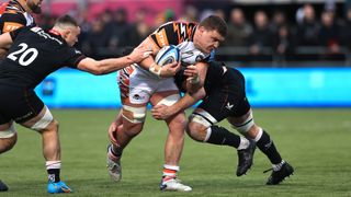 asper Wiese of Leicester Tigers is tackled during the Gallagher Premiership Rugby match between Saracens