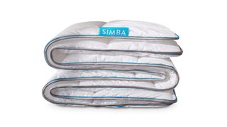 Best duvets: The Simba Hybrid Duvet in white with blue Simba logo tag