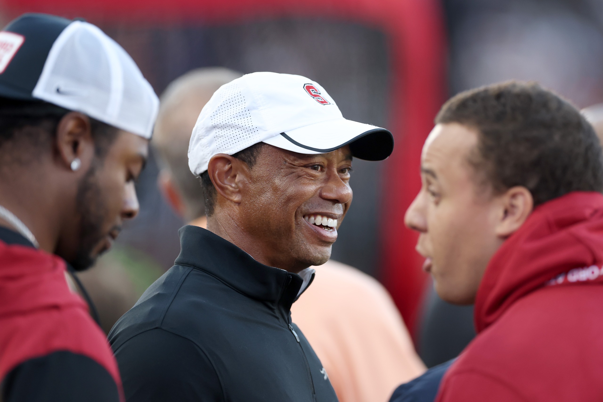 Tiger Woods smiles during an appearance at the Stanford Cardinals college football game against the Miami Hurricanes on Saturday, September 5, 2026
