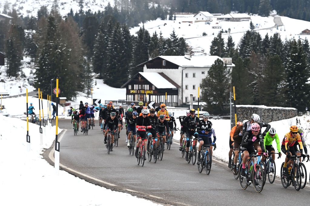BRUNICO ITALY APRIL 21 A general view of the peloton climbing to the snowy and mountainous pass of the Passo Lavaz 1808m during the 46th Tour of the Alps 2023 Stage 5 a 1445km stage from Cavalese to Brunico on April 21 2023 in Brunico Italy Photo by Tim de WaeleGetty Images