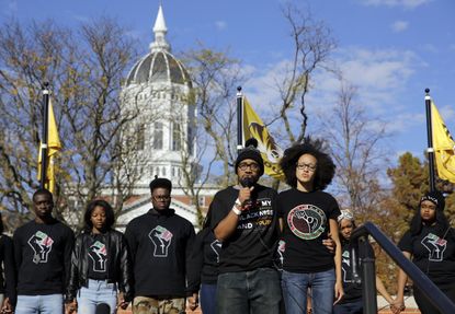 Protesters address the crowd following the resignation of University of Missouri system president Tim Wolfe.