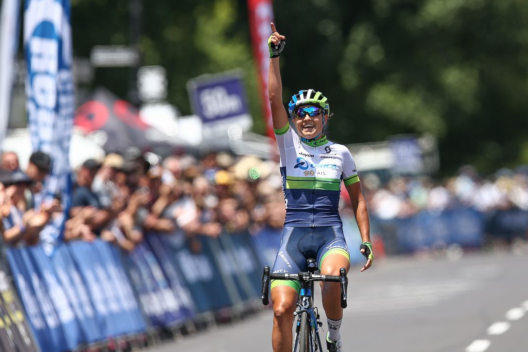 Lizzie Williams (Orica-AIS) points to the sky having won the stage