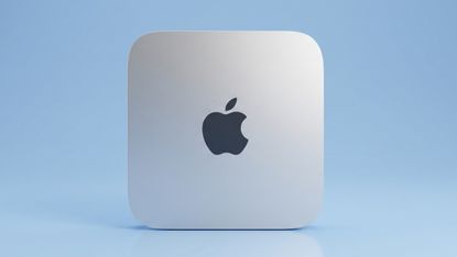 Apple Mac mini on a blue background