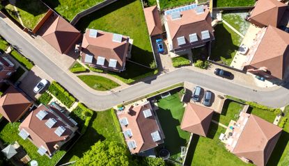 An aerial view of a well-maintained suburban neighborhood.