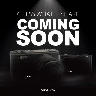 Yashica City 200 and 300 cameras on black background