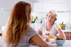 Mother and daughter having tense conversation