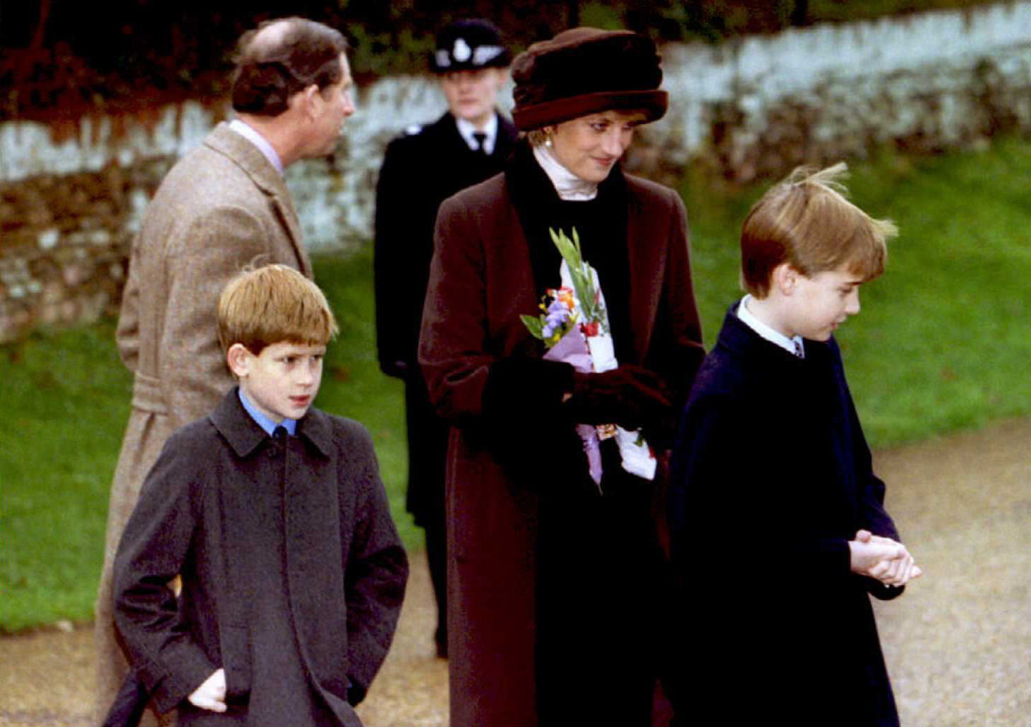 Princess Diana, Prince harry and Prince William accepting gifts from the public on Christmas Day 1994