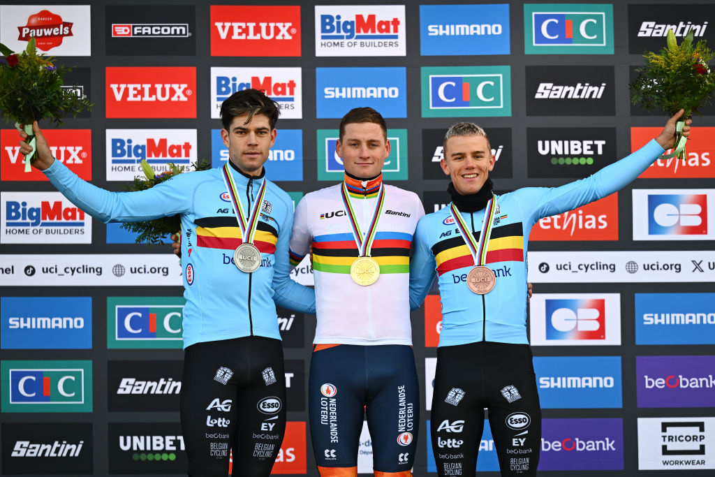 LIEVIN, FRANCE - FEBRUARY 02: Silver medalist Wout Van Aert of Belgium, gold medalist Mathieu Van Der Poel of Netherlands and bronze medalist Thibau Nys of Belgium pose on the podium during the medal ceremony after the 76th UCI  Cyclo-Cross World Championships 2025 - Men's Elite on February 02, 2025 in Lievin, France. (Photo by Luc Claessen/Getty Images)