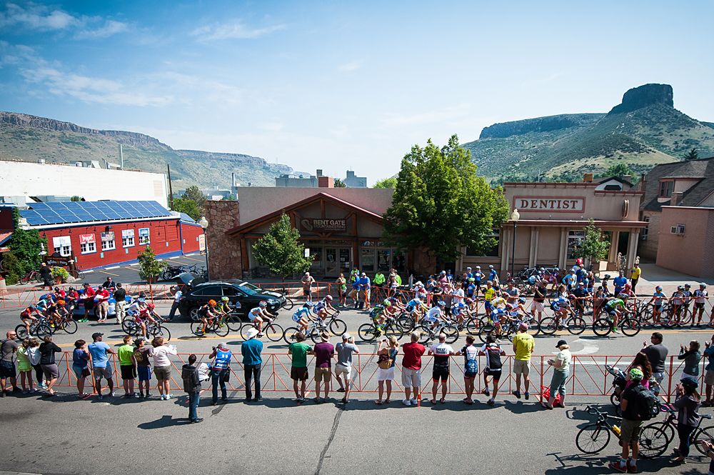 The womens field rolls up Washington Street under the shadows of the prominant South Table Mountain and the ever present Molson Coors Brewery.