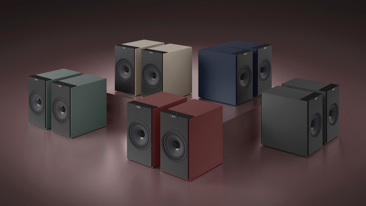 Five pairs of the KEF Coda W speaker arranged on a burgundy red background.